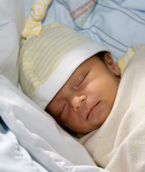 Eric  sleeping outside two weeks old