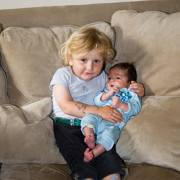 Jeremy’s and Kristin’s son Ambrose with Eric Gregory