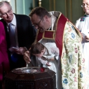 The baptism. Father Eric in the background