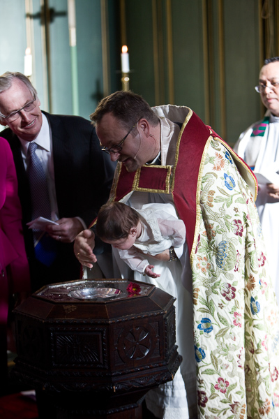 The baptism. Father Eric in the background