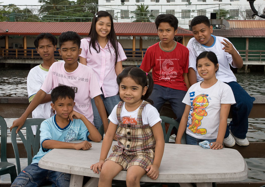 Mikee with the students in year 6 after a lunch at a waterfront restaurant