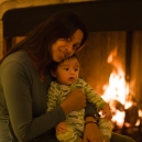 At the fireplace. Eric five months old. 2008