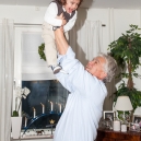 Up in the air on Godpa’s arms