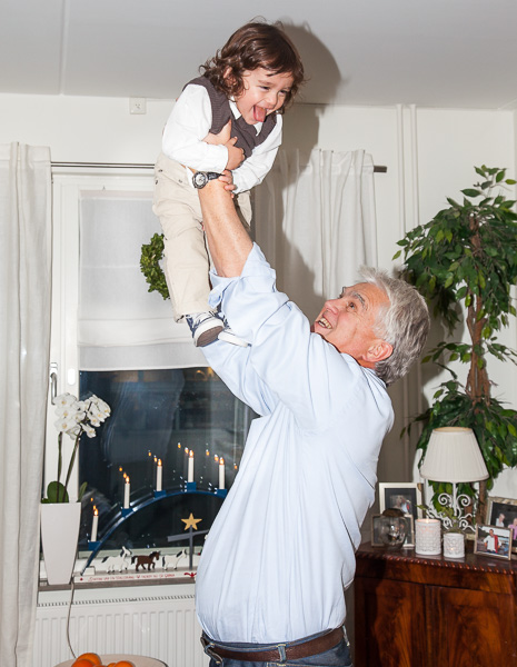 Up in the air on Godpa’s arms