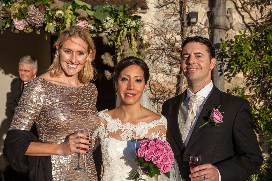 …Melanie with the bridal couple