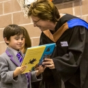 Eric receiving a prize from Mrs Colwill, head of Junior School