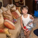 Eric playing with his Christmas stocking gifts in the early morning